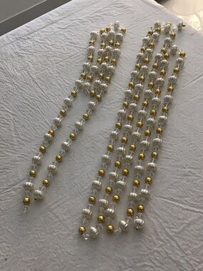 2 Strands of White & Gold Plastic Beads.  ##